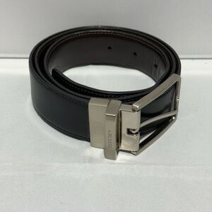Lacoste Men's Black Leather Belt with Silver Buckle - Reversible Black / Brown